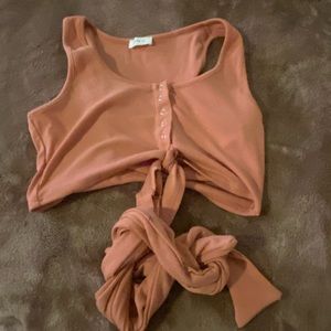 Better be crop top with tie at bottom size medium